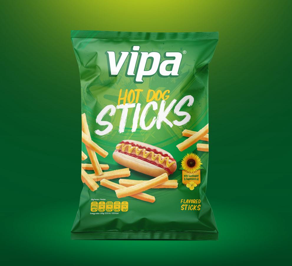 Front-facing green snack bag with a hot dog, stick-shaped snacks, and bold white lettering; centered against a green gradient background.